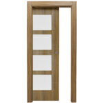 Wooden interior door with four white rectangular panels in a vertical row and a round door knob on the right.