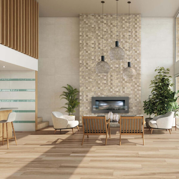 Modern living room with a tall tiled fireplace wall, hanging spherical pendant lights, and mid-century wooden seating around a gas fireplace.