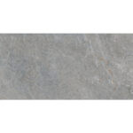 Close-up of a rough gray concrete surface with subtle veins and specks.