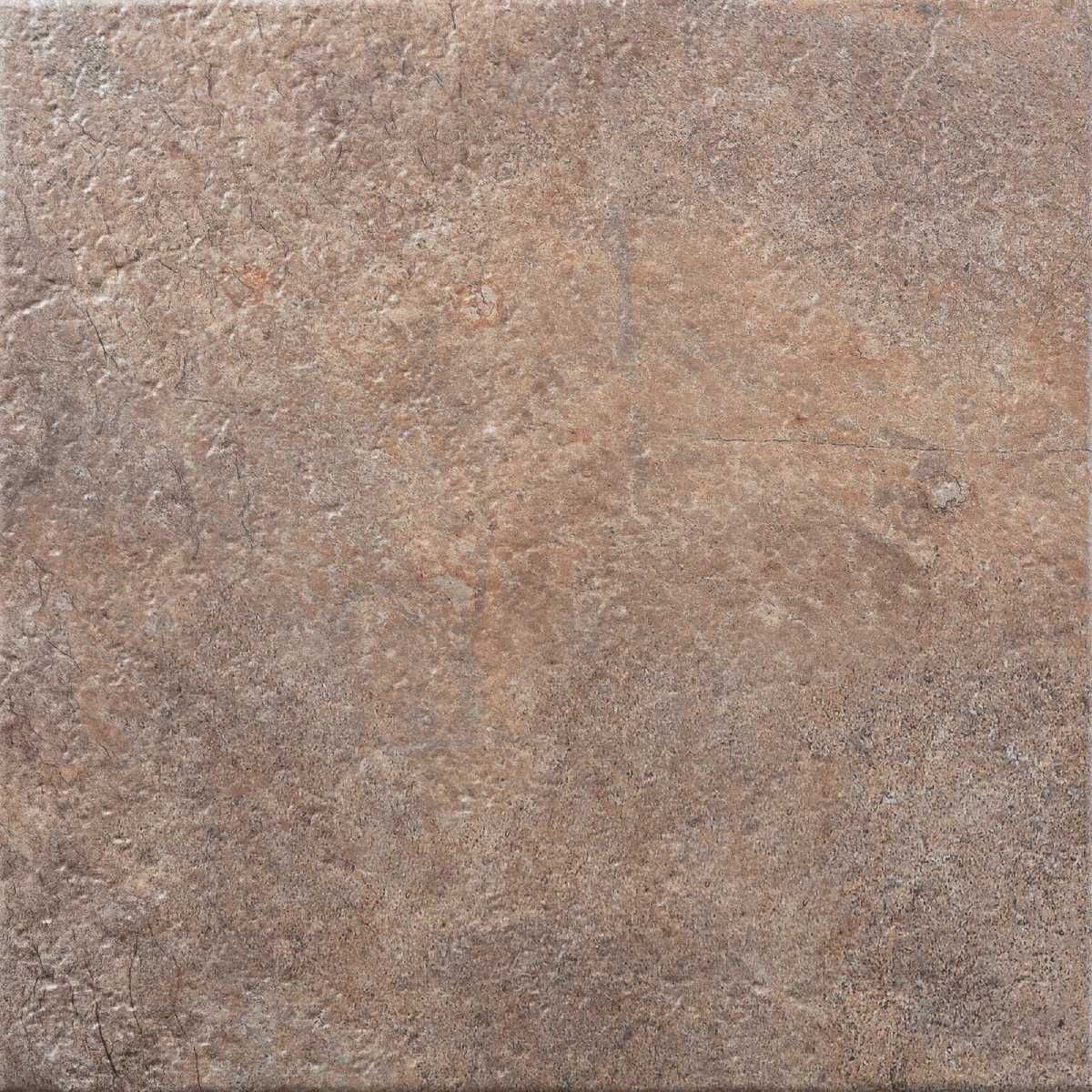 pym cati brown mate 33,3x33,3 Close-up of a rough, weathered brown stone surface with cracks and a reddish patina.