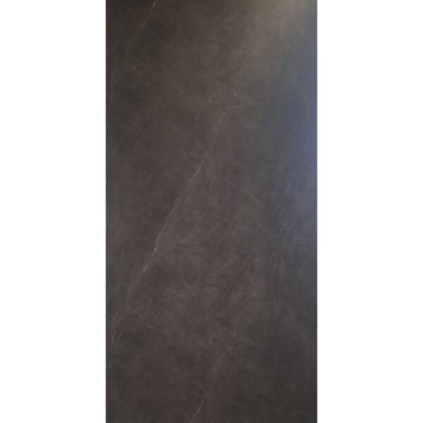 Dark charcoal textured surface resembling concrete or slate panel, vertical orientation.