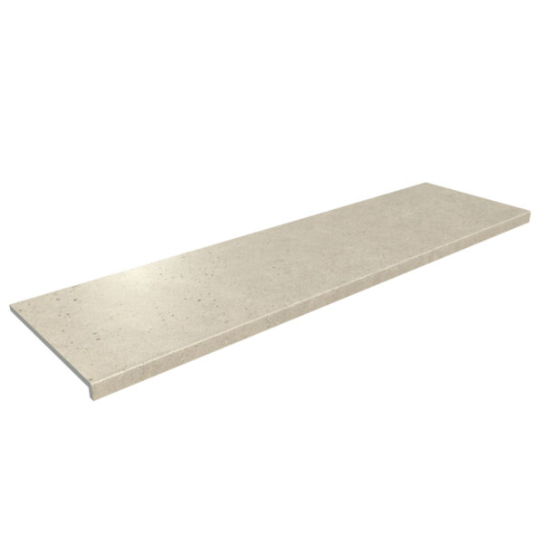 Long beige stone countertop trim with a rounded bullnose edge viewed from the side.
