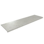 Long rectangular concrete slab or countertop plank shown at an oblique angle, light gray with small speckles.